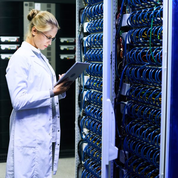 Female Scientist Working with Supercomputer