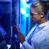 Female Scientist Working with Supercomputer Servers